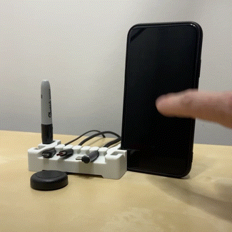 DeskBrick™ Weighted Cord Organizer, Cable Wrap, Phone Stand +Multiuse Gadget