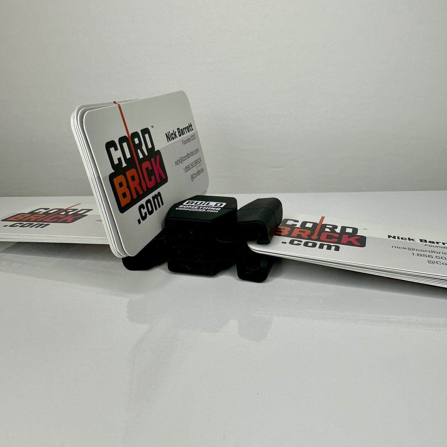 Black Promotional CordBrick holding business cards