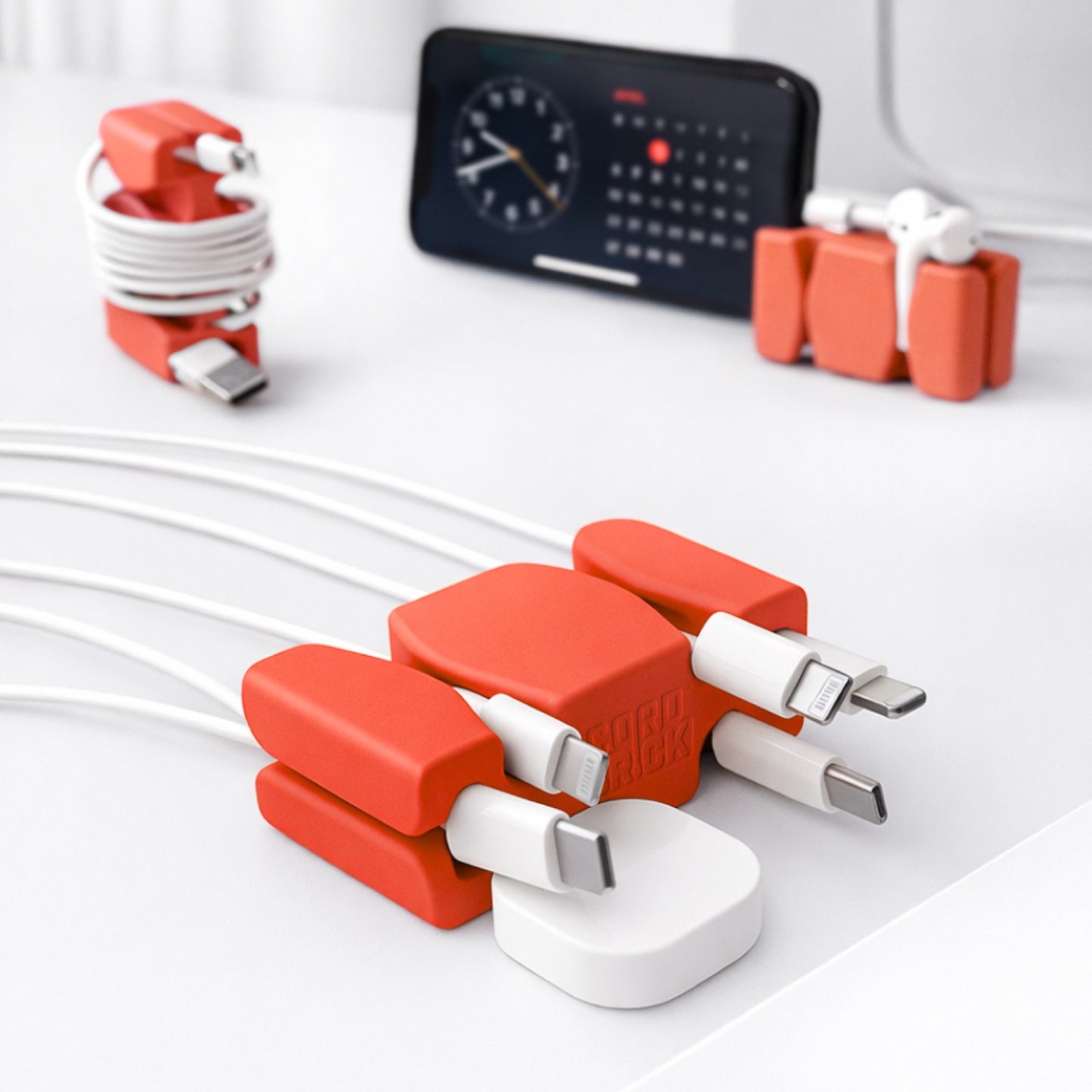 CordBrick Stocking Stuffers for Adults Cord Management Weighted Cord Holder Cable Wrap Phone Stand - Multiuse Gadget Organizer for Nightstand, Desk. Gift for Men, Durable Silicone.