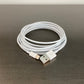 10 foot iPhone charger cord on a gray desktop